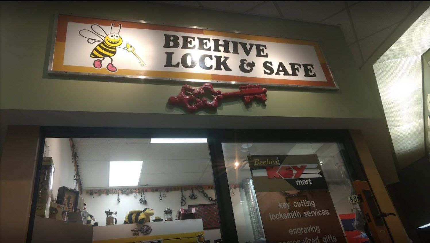 Beehive Lock and Safe storefront and banner above the store